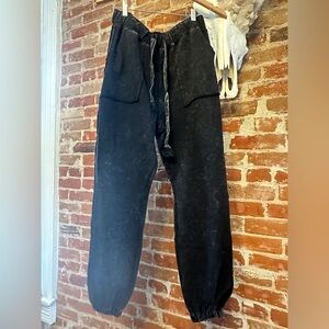 Black distressed sweat pants